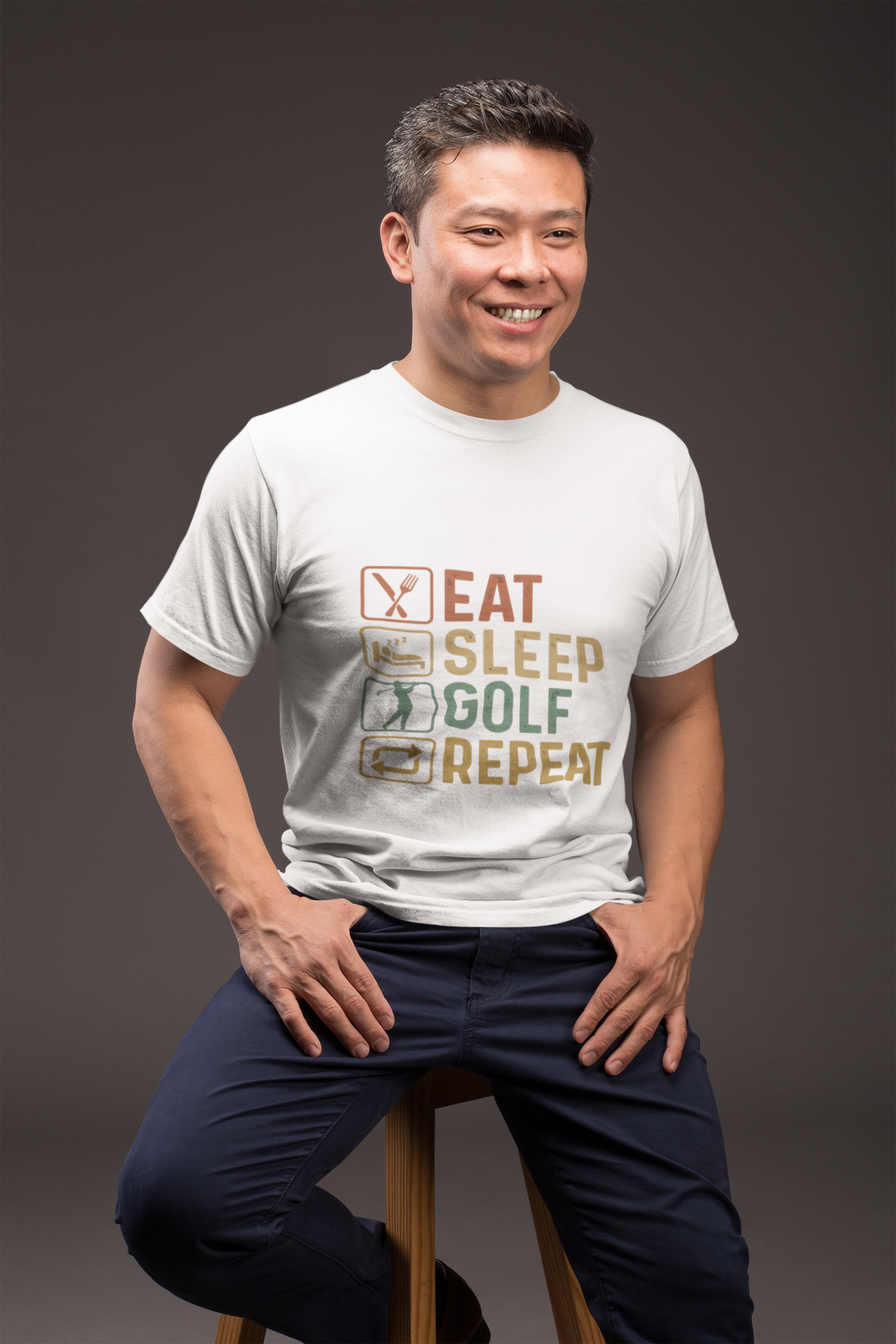 mockup-of-a-happy-man-wearing-a-t-shirt-sitting-on-a-stool-21237.png
