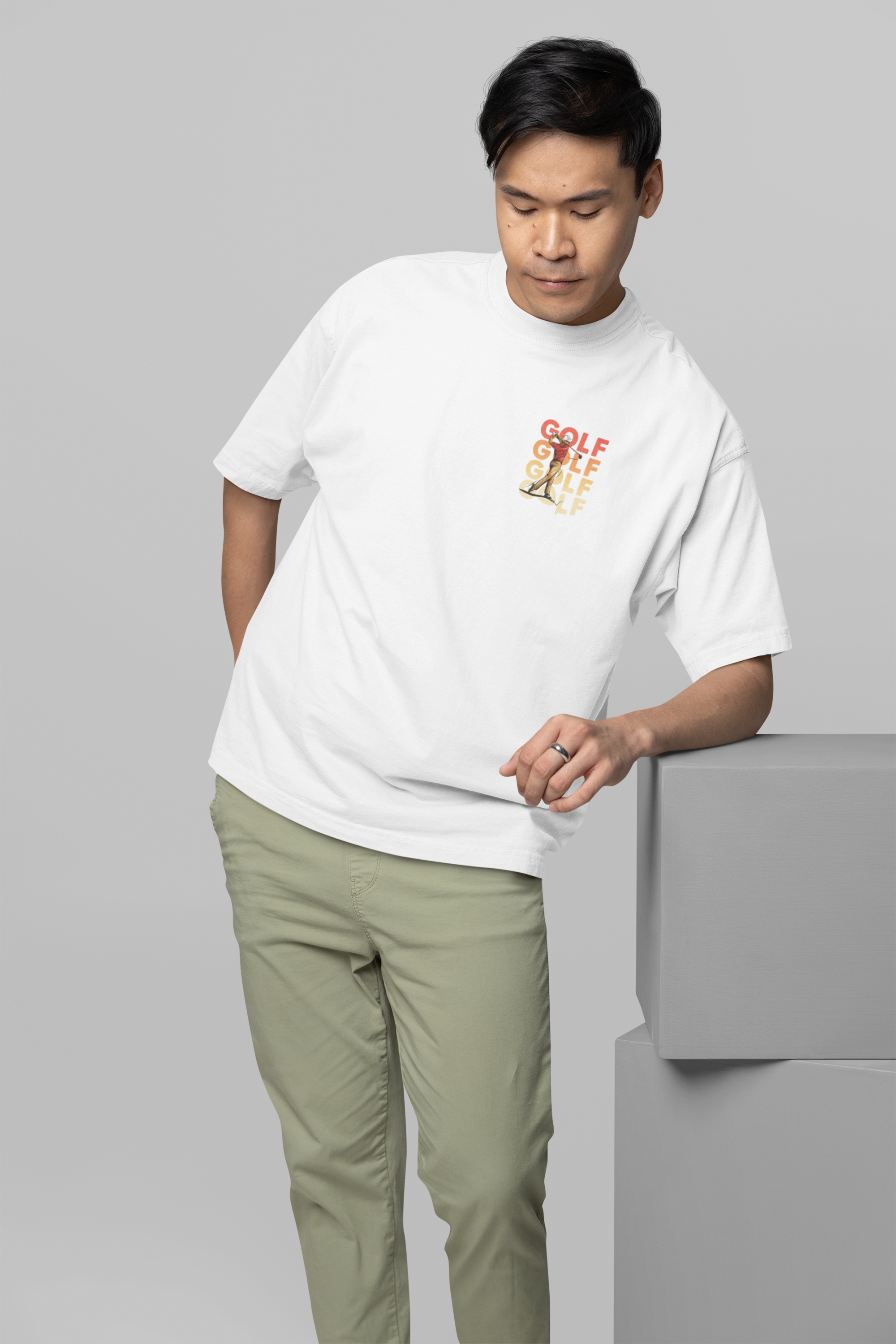 oversized-t-shirt-mockup-featuring-a-man-leaning-on-a-colorful-cube-m38921_50daddca-7cde-42d0-9671-739bb3fdd119.png